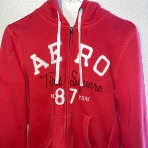aero orange zip up